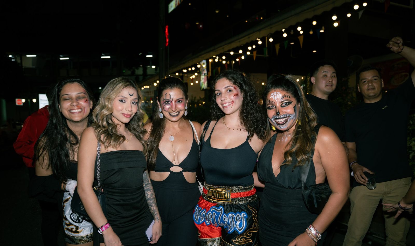 A group of guests in Halloween face paint
